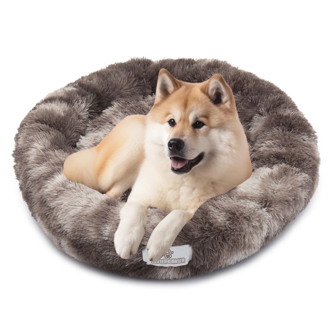Hund schläft im Donut Hundebett Wolke 7

Flauschiges Hundekissen für kleine Hunde

