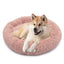 Hund schläft im Donut Hundebett Wolke 7

Flauschiges Hundekissen für kleine Hunde


