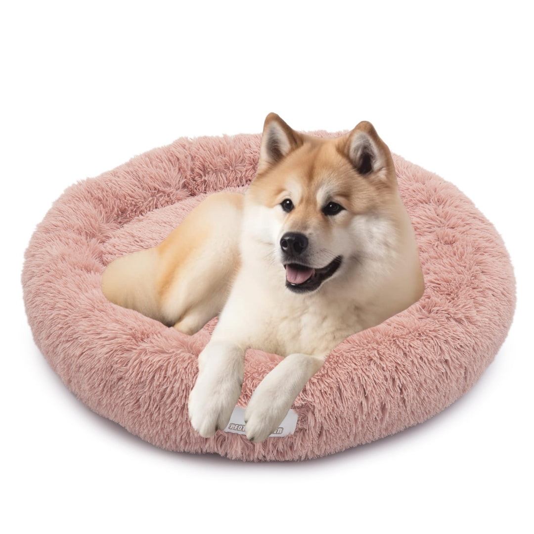 Hund schläft im Donut Hundebett Wolke 7

Flauschiges Hundekissen für kleine Hunde


