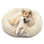 Hund schläft im Donut Hundebett Wolke 7

Flauschiges Hundekissen für kleine Hunde


