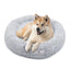 Hund schläft im Donut Hundebett Wolke 7

Flauschiges Hundekissen für kleine Hunde

